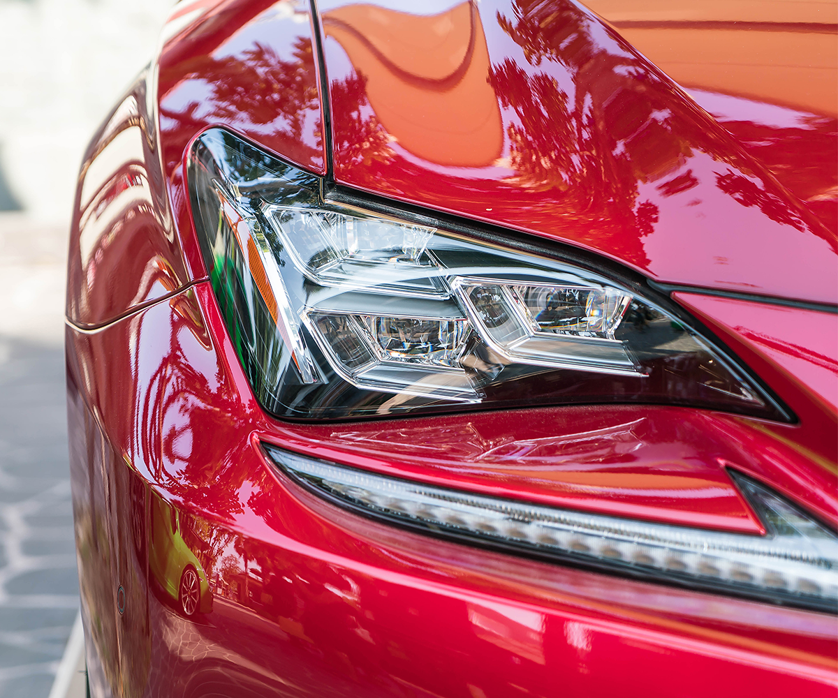 Close up of headlights on a right-hand drive car.